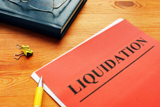 The word liquidation is printed on the red page.